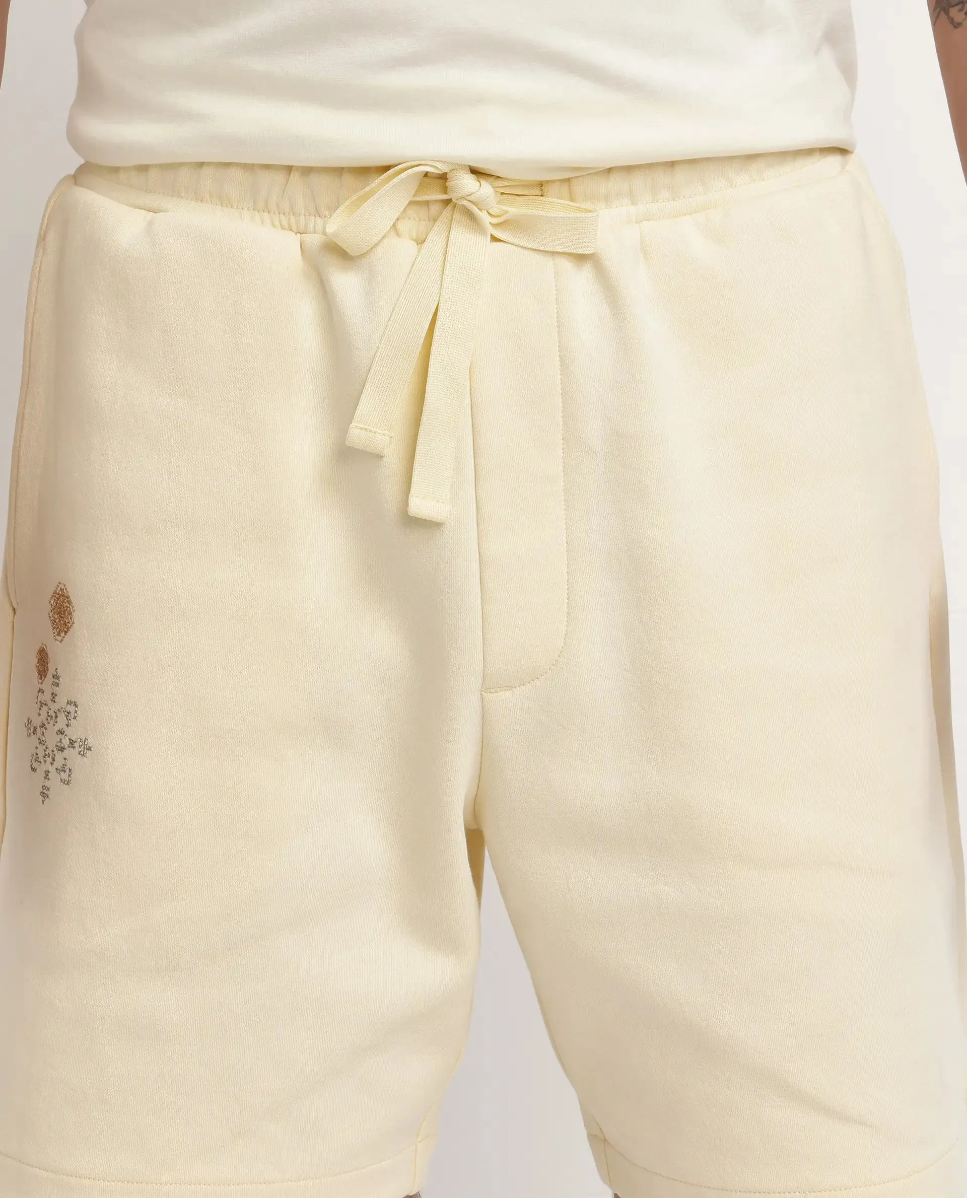 Rare Rabbit Men Enox Pastel Yellow Cotton Elastane Fabric Plain Shorts