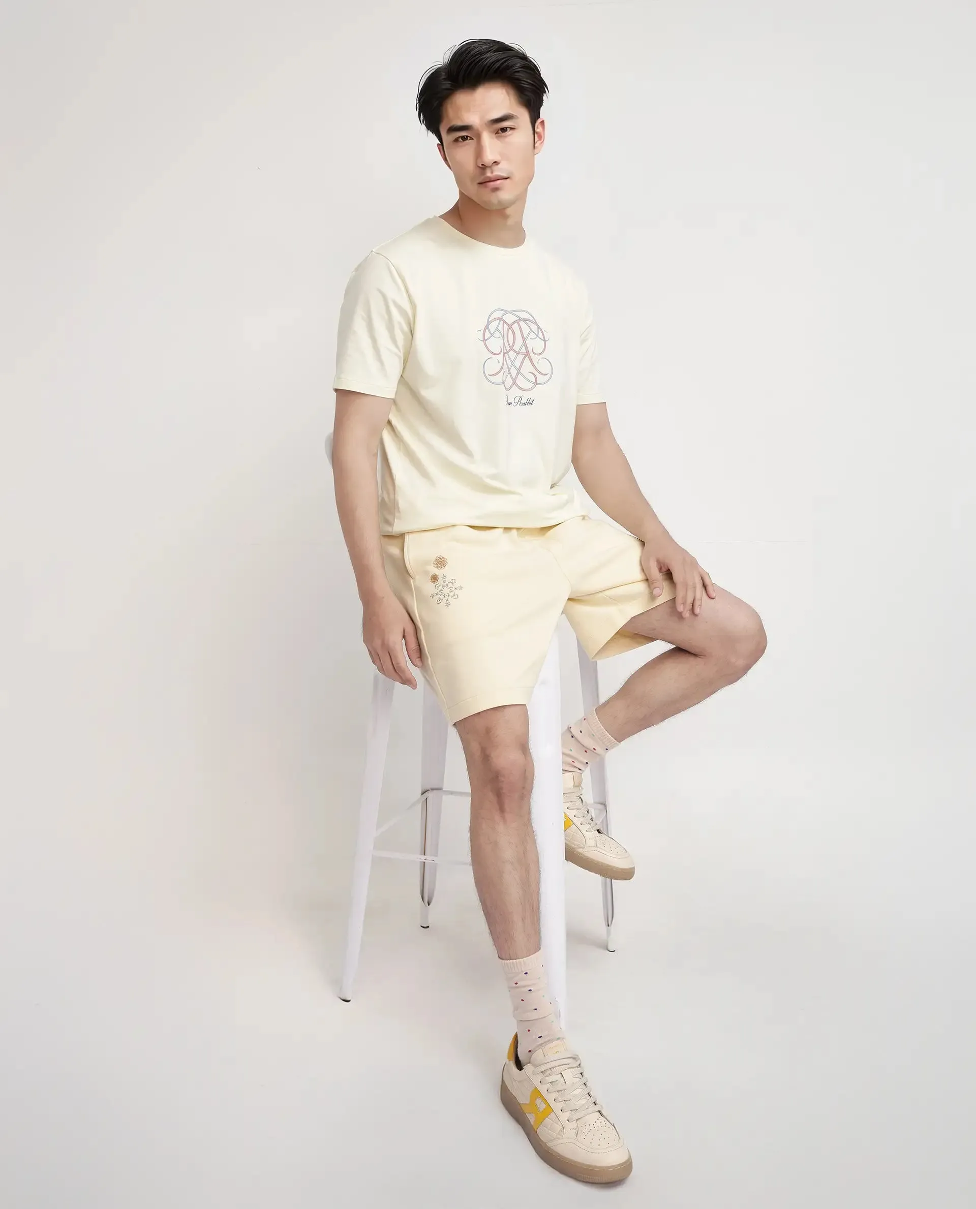 Rare Rabbit Men Enox Pastel Yellow Cotton Elastane Fabric Plain Shorts
